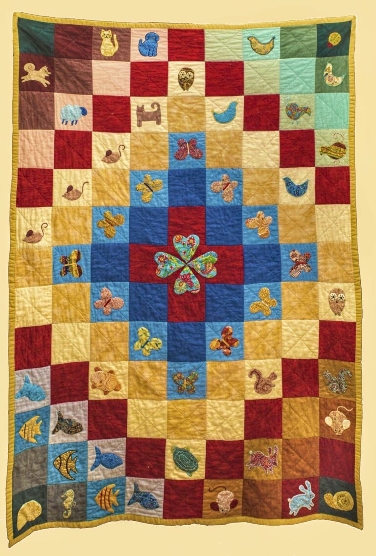 Child's quilt, hand appliqued birds, fish and animals on flannel squares, machine quilted