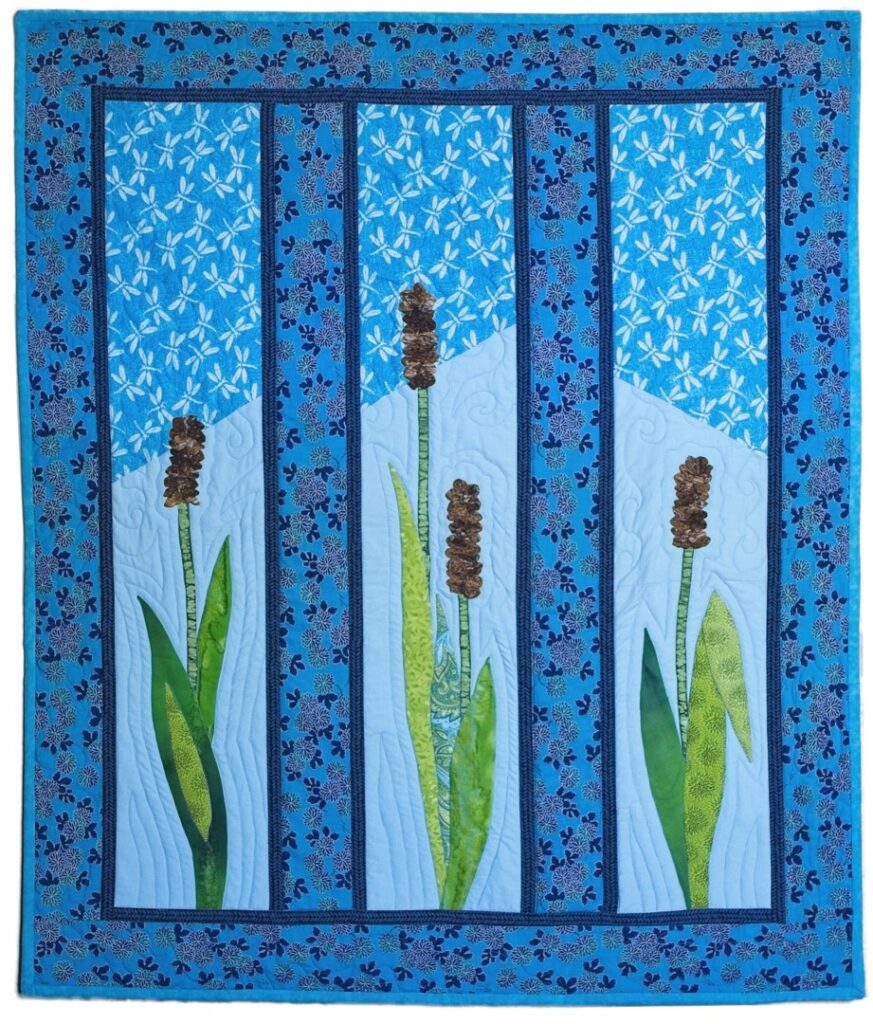 Child's quilt, hand appliqued and ruched cattails, dragonfly print