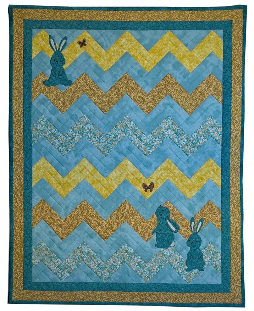 Child's quilt, bunny quilt, rabbit applique, hand applique bunnies and butterflies, zig-zag quiltl, Project Linus quilt, Spingarn quilts