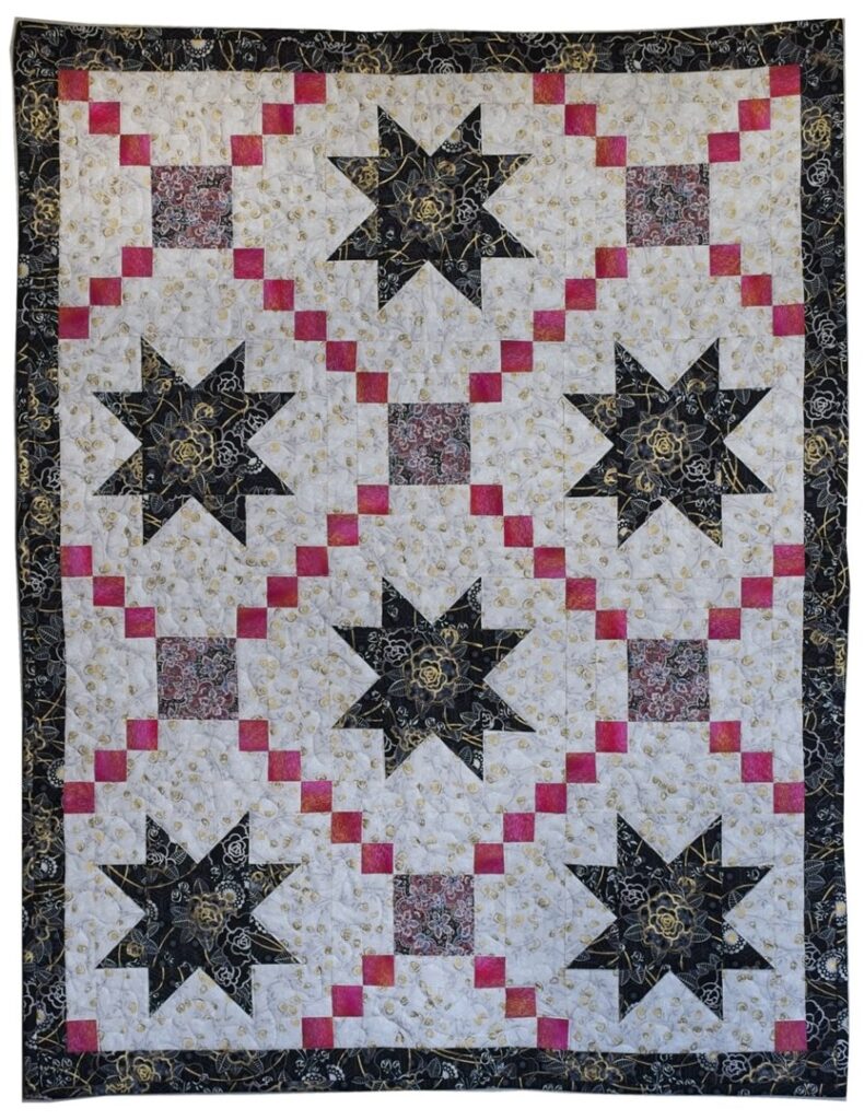 Sawtooth star quilt, black and pink quilt, Spingarn quilts, gold metallic star fabric