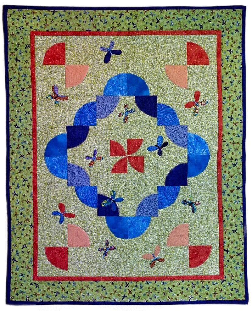 Child's quilt, blue and orange quilt, butterfly applique, drunkard's path quilt blocks, Project Linus quilt, Spingarn quilt