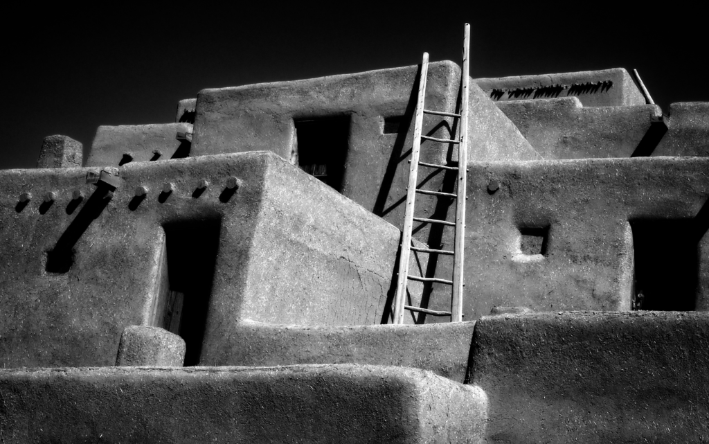 Taos Pueblo, New Mexico; Native American archaeology, New Mexico pueblos, adobe buildings, adobe wall, New Mexico historical sites, Richard Spingarn photography, Spingarn Studio